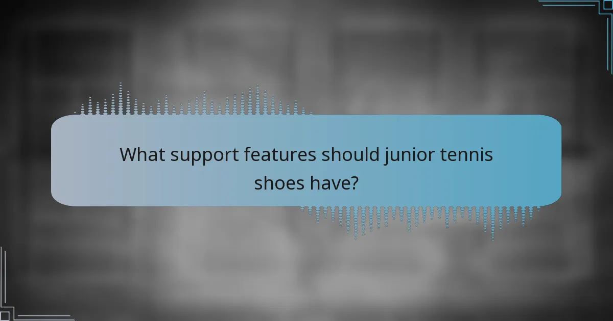 What support features should junior tennis shoes have?